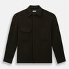 View 1 of product The Turnbull & Asser Dark Chocolate Greenwich Knitted Overshirt is crafted from Italian wool, with a classic collar, two flap chest pockets, and a concealed button front—offering a sleek cardigan alternative. Shown on a white background.