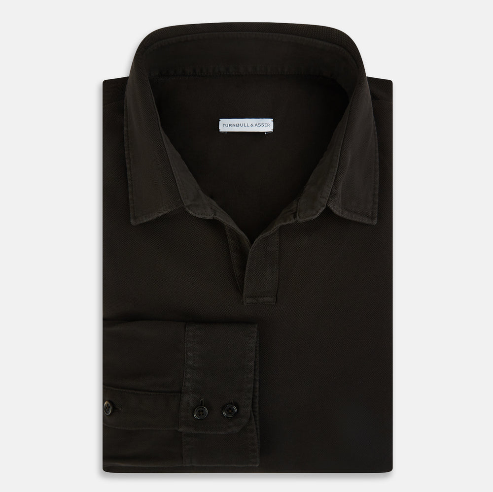 A brown Rugby Polo Shirt by Turnbull & Asser, made of pure cotton with long sleeves, a collar, and a short buttonless placket, is laid flat on a white background.