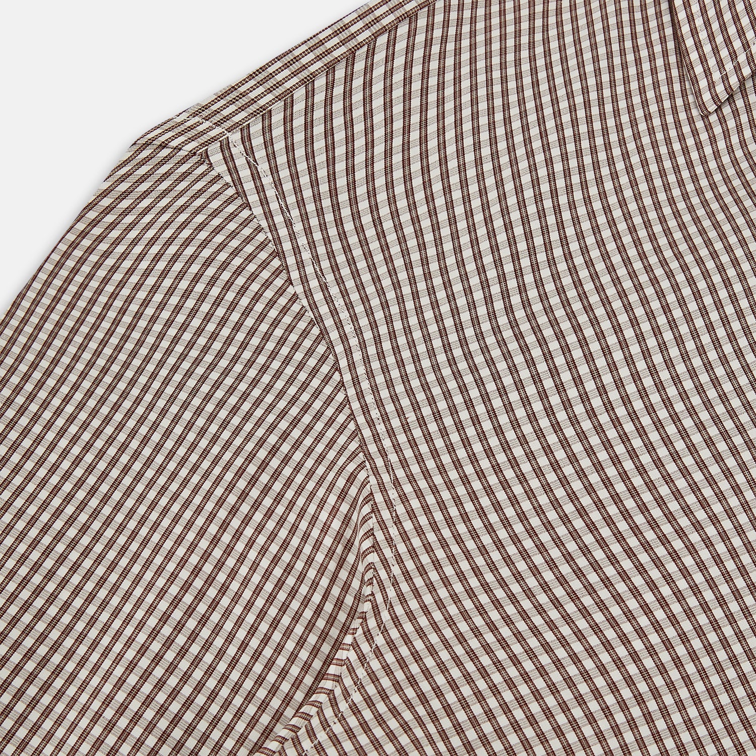 View 6 of product The Turnbull & Asser Burgundy Micro Check Westminster Shirt is a long-sleeved button-up with a classic collar and tailored fit, featuring a subtle micro check pattern, shown against a white background.