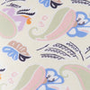 View 3 of product A rolled-up Cream Multi Bloomsbury-Inspired Pattern Silk Tie by Turnbull & Asser, featuring a pastel floral and paisley design in green, blue, pink, and orange tones, displayed on a white background.