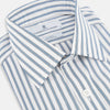 View 2 of product The Turnbull & Asser Blue Multi Wide Track Stripe Mayfair Shirt is a long-sleeve, button-up shirt with a classic collar and vertical blue and white stripes, shown on a white background.