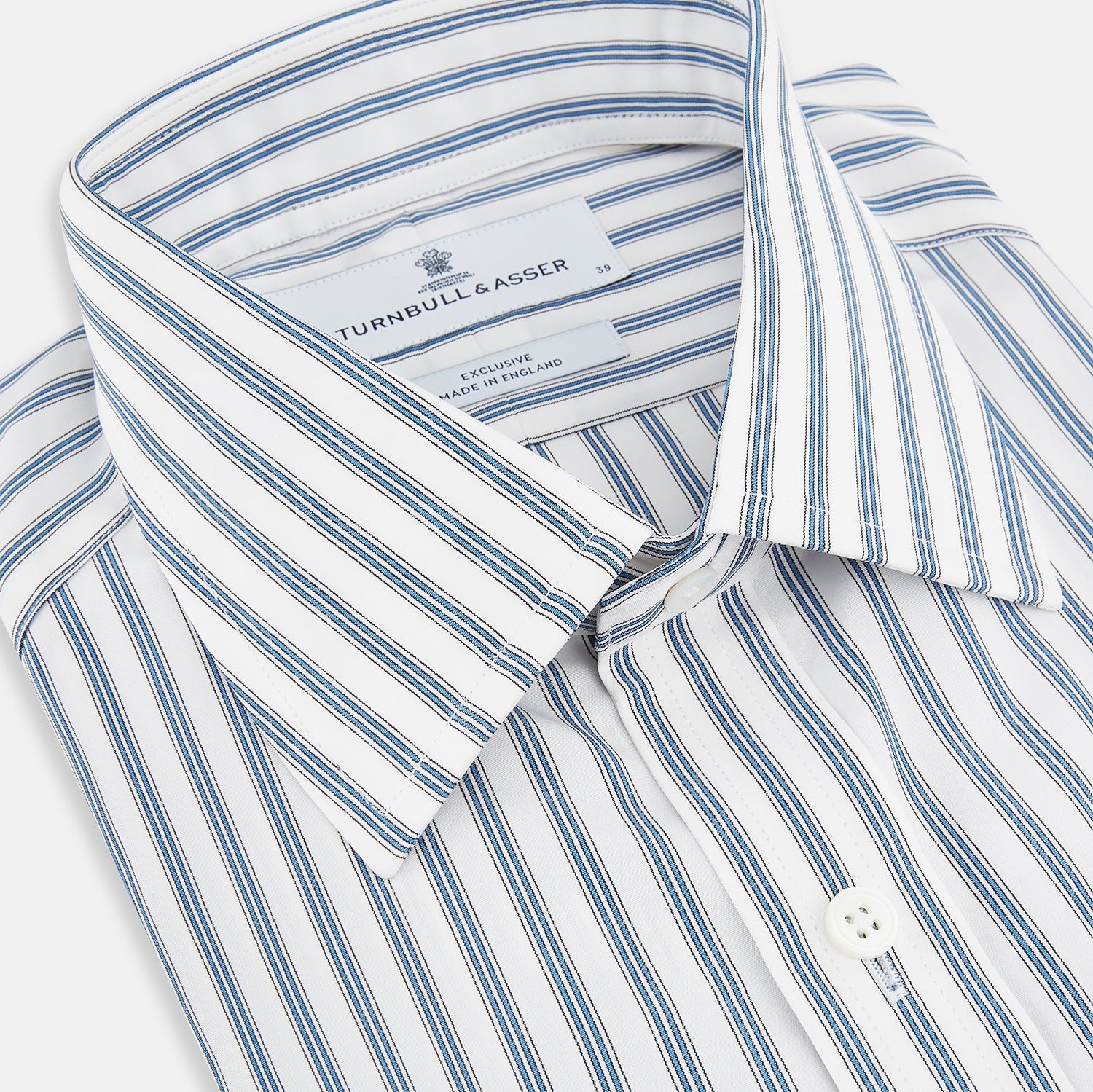 View 2 of product The Turnbull & Asser Blue Multi Wide Track Stripe Mayfair Shirt is a long-sleeve, button-up shirt with a classic collar and vertical blue and white stripes, shown on a white background.