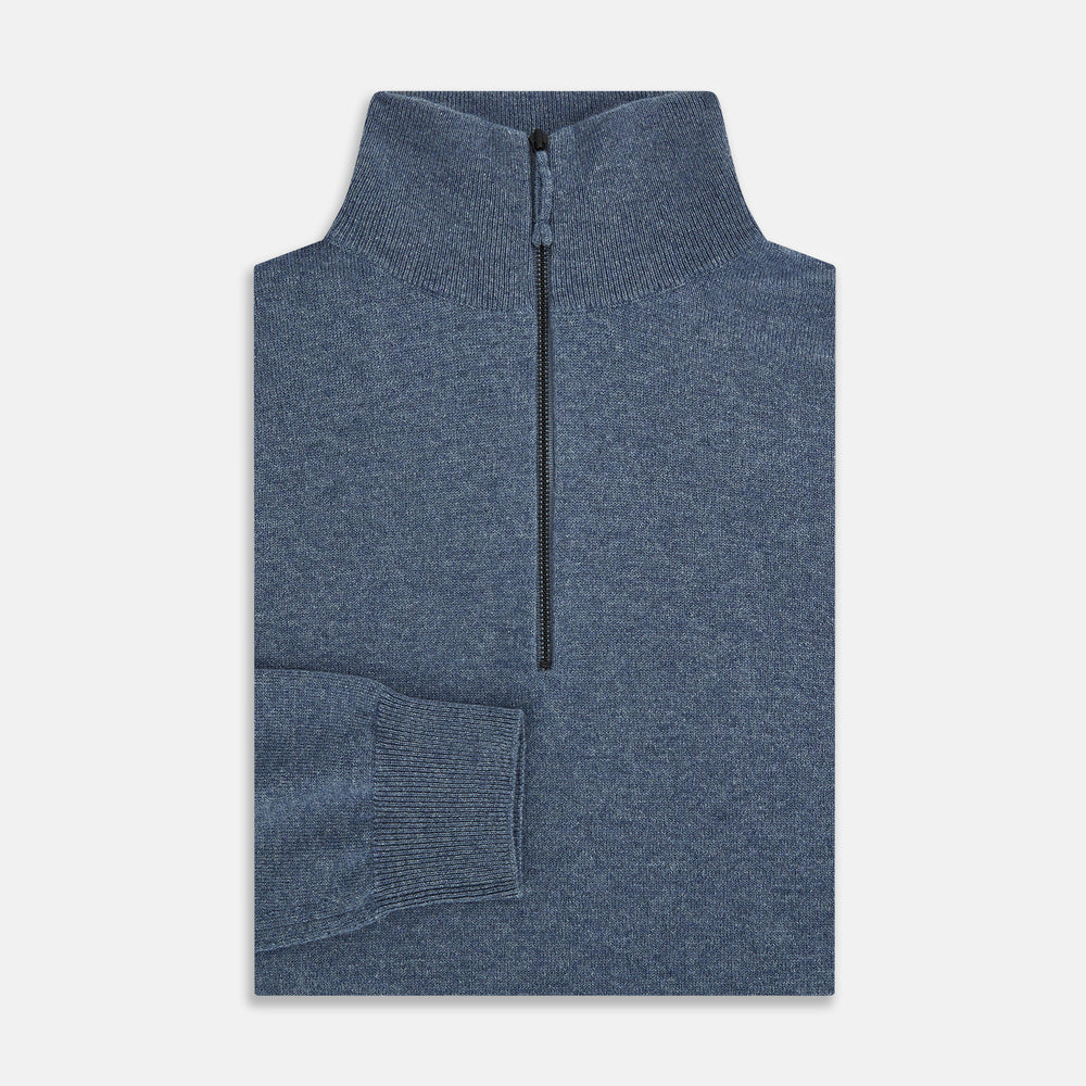 The Blue Melange Half-Zip Cashmere Jumper by Turnbull & Asser features a high collar, ribbed cuffs and hem, and long sleeves. This pullover sweater is shown against a plain white background.
