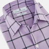 View 2 of product A long-sleeve, button-up Lilac Grid Check Windsor Shirt by Turnbull & Asser, featuring a black windowpane pattern and a refined Windsor collar, displayed on a plain white background.