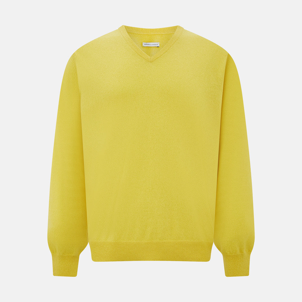 The Turnbull & Asser Canary Yellow Cashmere V-neck Jumper features long sleeves and ribbed cuffs and hem, shown against a white background.