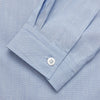 View 2 of product The Turnbull & Asser Slate Blue Chambray Holiday Fit Fellows Shirt features long sleeves and a classic collar, laid flat on a white background—a versatile summer piece for any occasion.