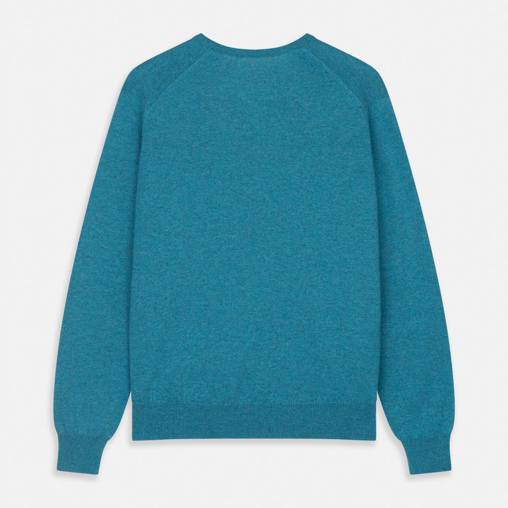 The Teal Paden V-Neck Jumper by Turnbull & Asser is a pure cashmere sweater in teal blue, featuring long sleeves with ribbed cuffs and hem, shown flat on a light gray background.