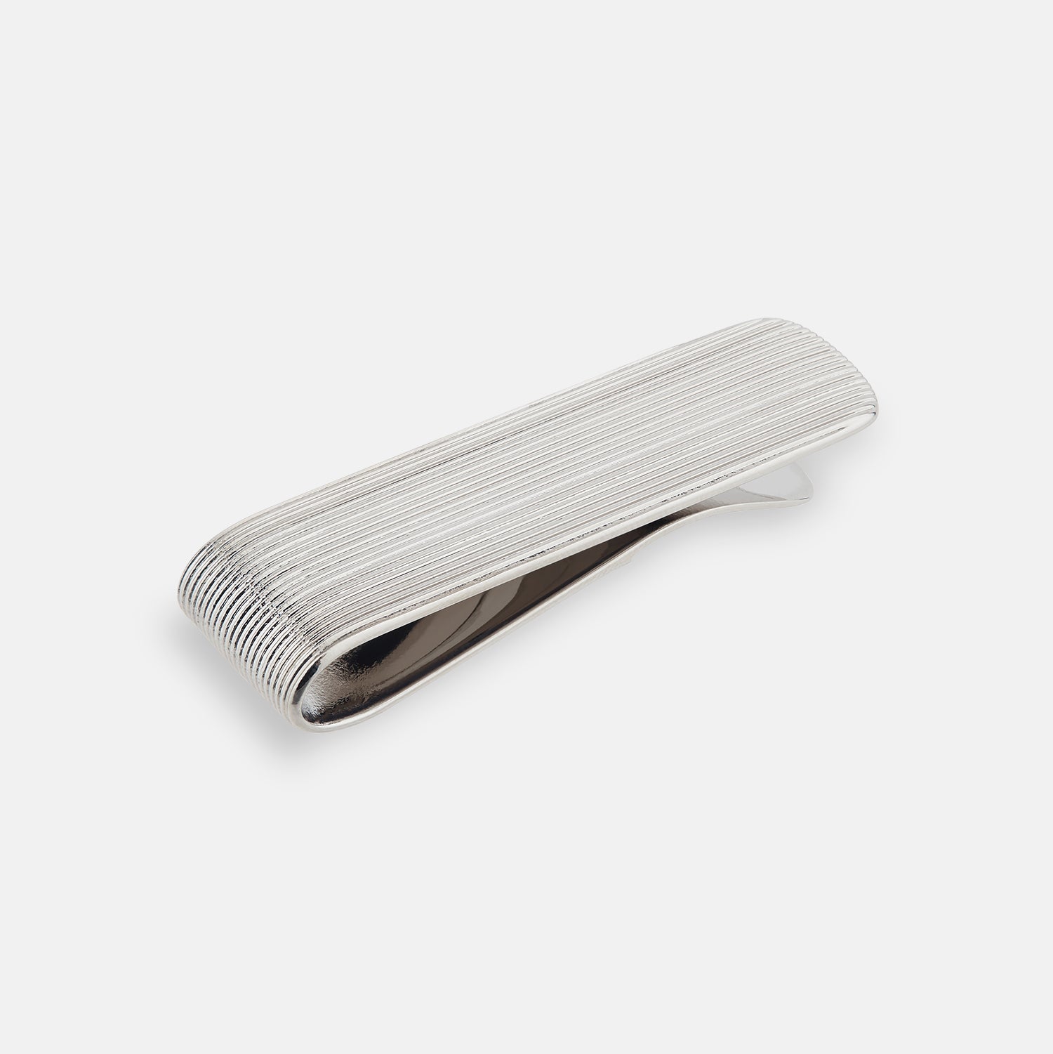 View 1 of product The Turnbull & Asser Silver Striped Money Clip features a ribbed, striped pattern and is displayed against a plain white background.