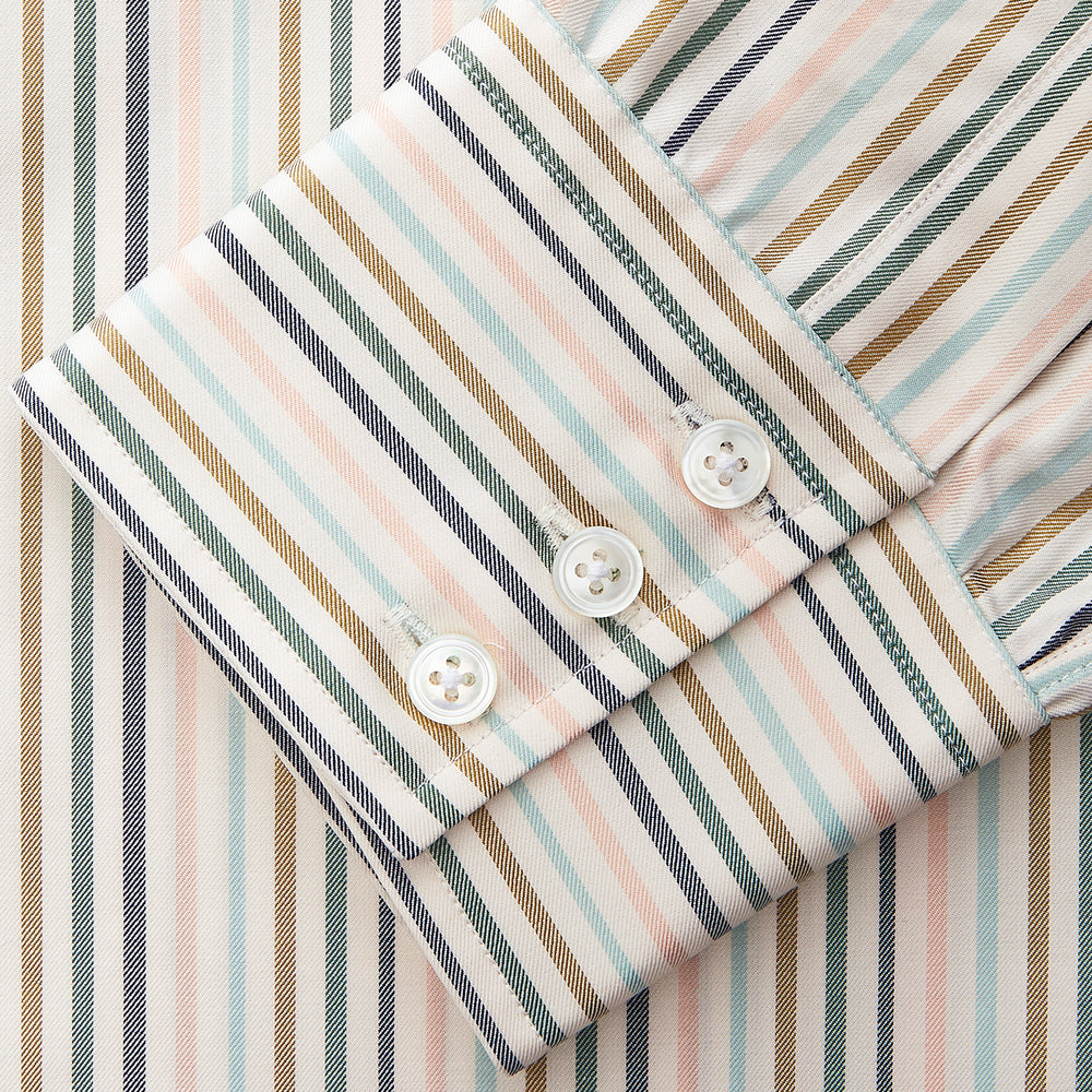 The Green Multi Stripe Regular Fit Shirt by Turnbull & Asser features a T&A collar, 3 button cuffs, and thin blue, green, yellow, and red stripes on white—adding a lively touch to any wardrobe.
