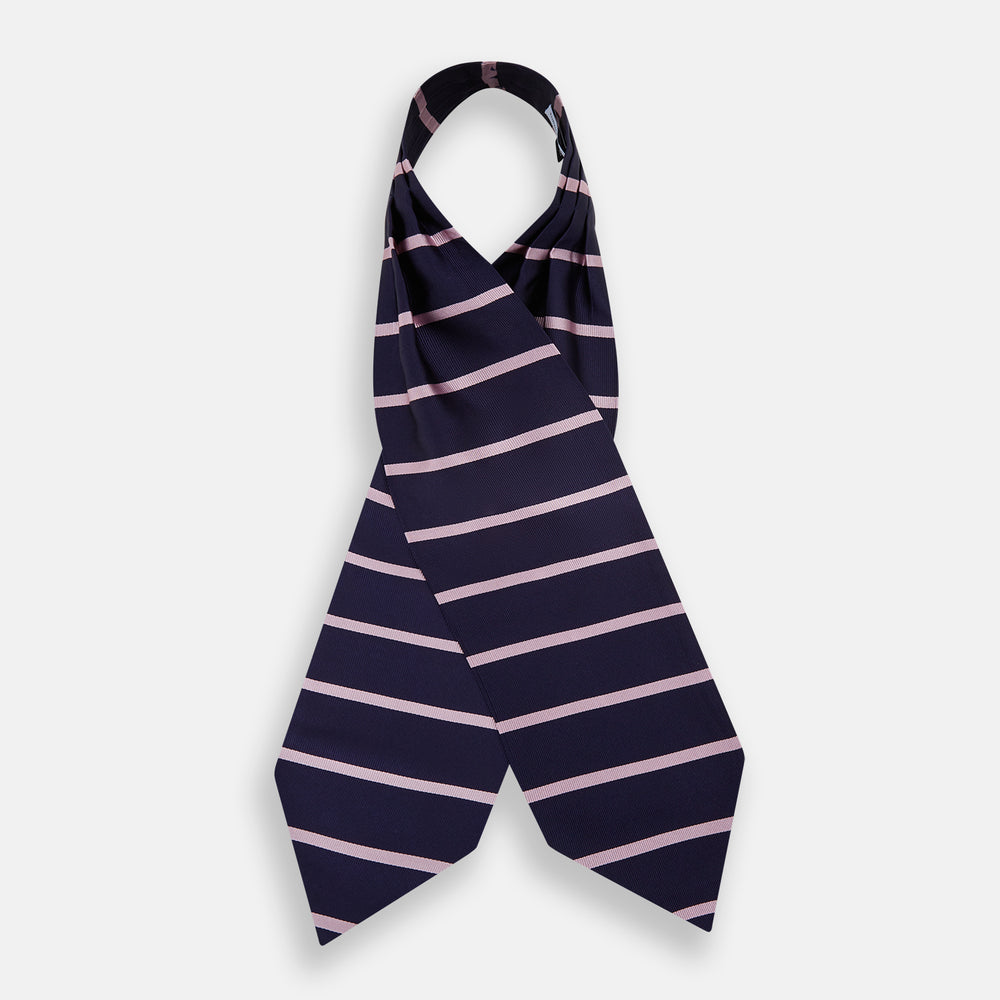 The Turnbull & Asser Pink Stripe and Navy Silk Cravat features evenly spaced light pink stripes on navy silk—a refined British style wedding accessory, elegantly displayed against a white background.