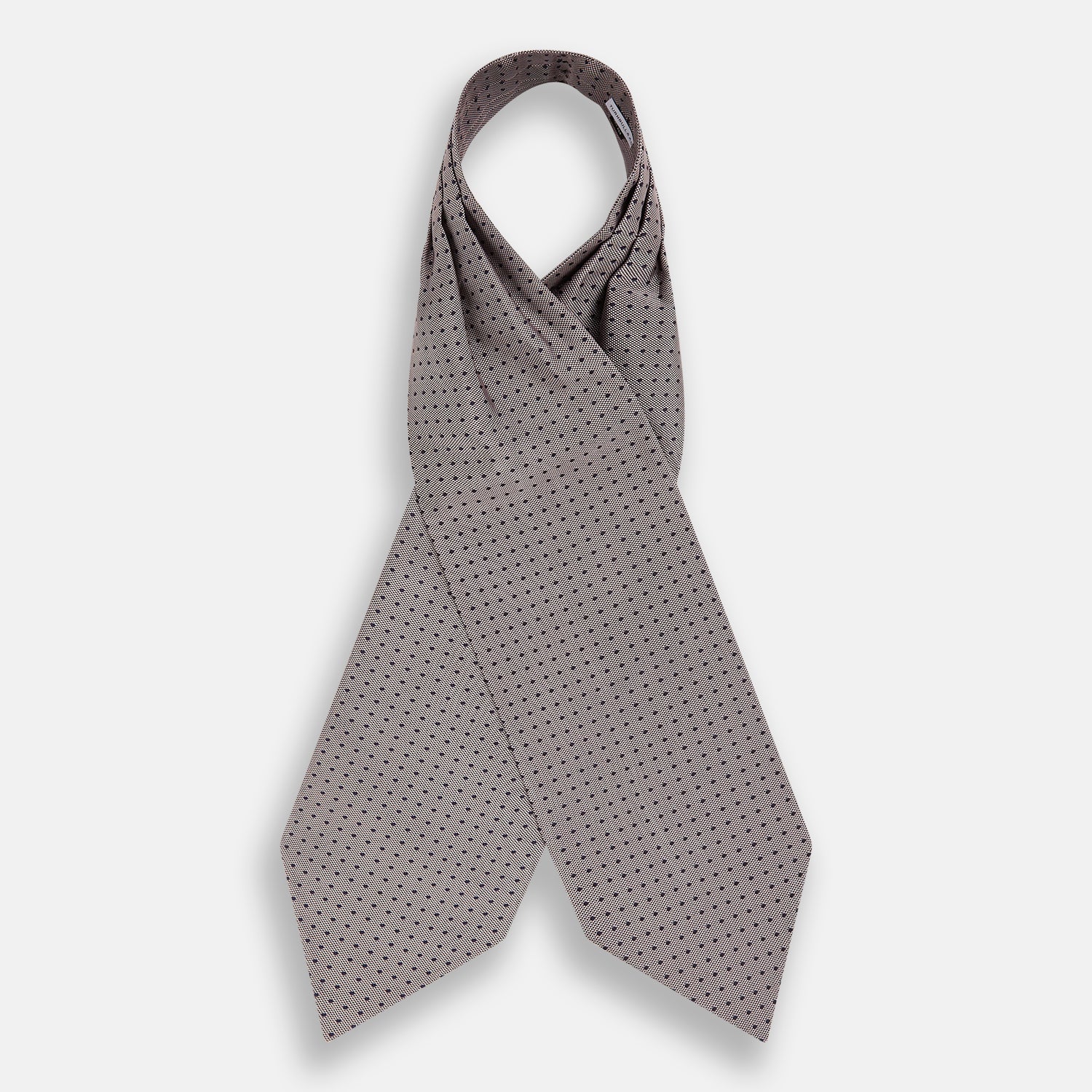 View 2 of product A folded, light-colored pocket square with small dark dots is displayed on a white background. Neatly arranged in a pointed fold, it pairs perfectly with the Turnbull & Asser Lilac and Navy Micro Dot Silk Cravat for an elegant look.