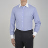 View 2 of product The Wall Street Shirt with White T&A Collar by Turnbull & Asser, as seen on Gordon Gekko, is folded neatly to showcase its light purple color, crisp French cuffs, and iconic contrasting collar against a plain background.