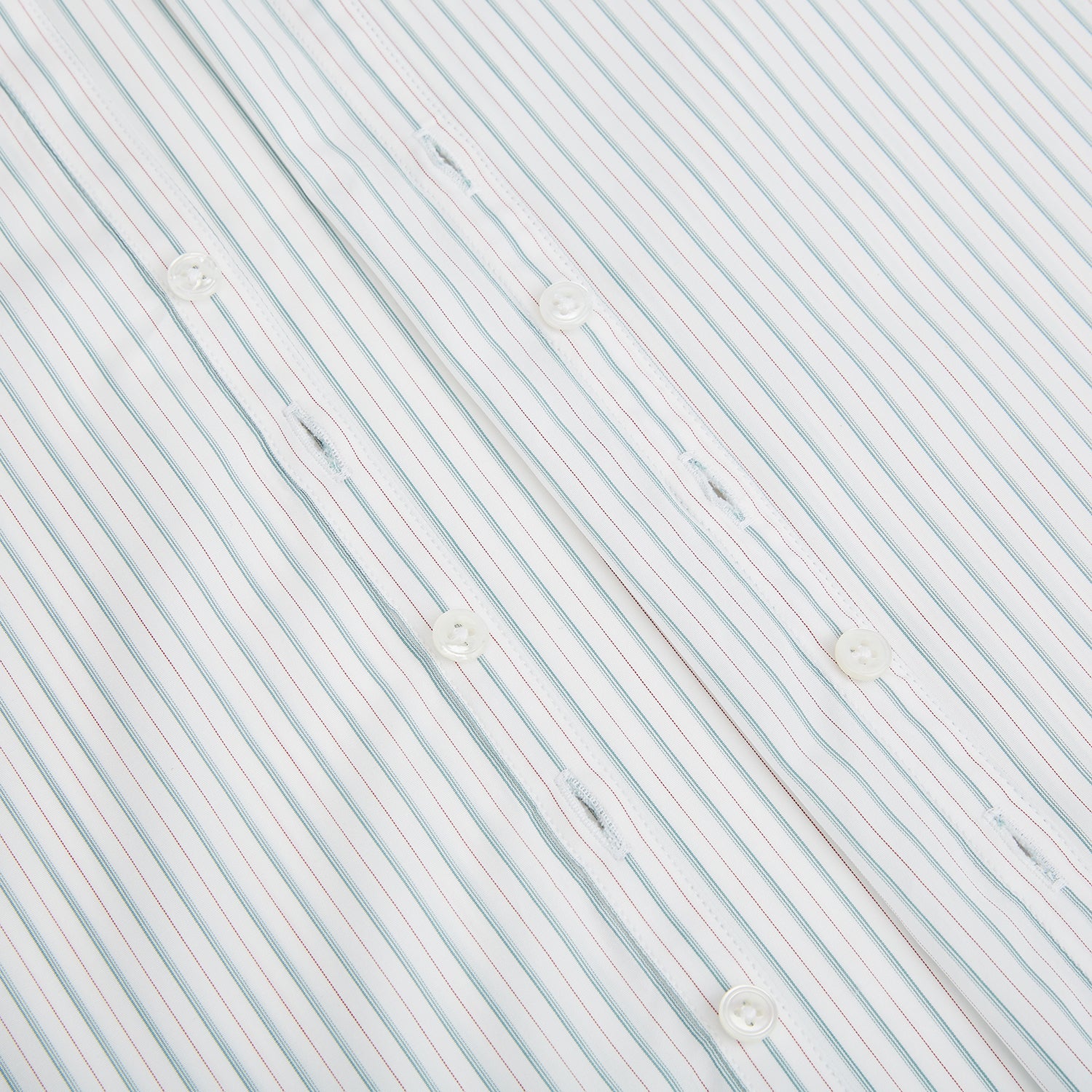 View 7 of product The Turnbull & Asser Turquoise and Red Multi Check Westminster shirt features long sleeves, a standard collar, and buttoned cuffs, showcasing fine British craftsmanship. It’s pictured laid flat on a white background.