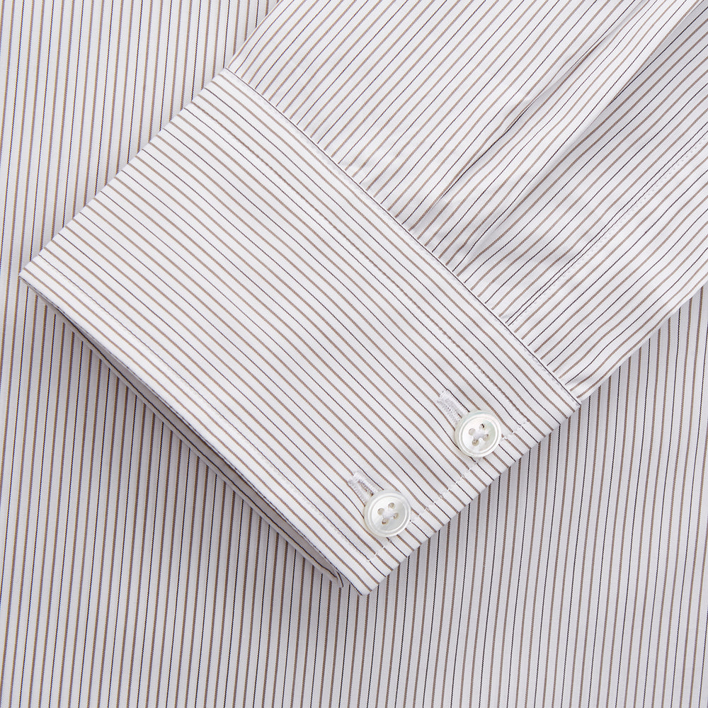 The Turnbull & Asser Sandstone Multi Stripe Cotton Tailored Fit Shelton Shirt features subtle vertical stripes, a pointed collar, and long sleeves, shown flat on a plain white background.