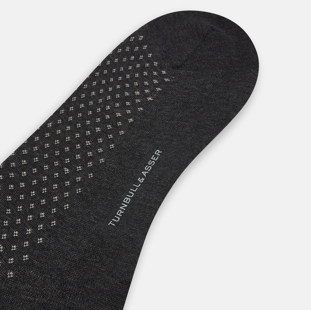 A single Grey Motif Long Sock by Turnbull & Asser, featuring a subtle pattern, is displayed on a plain white background.