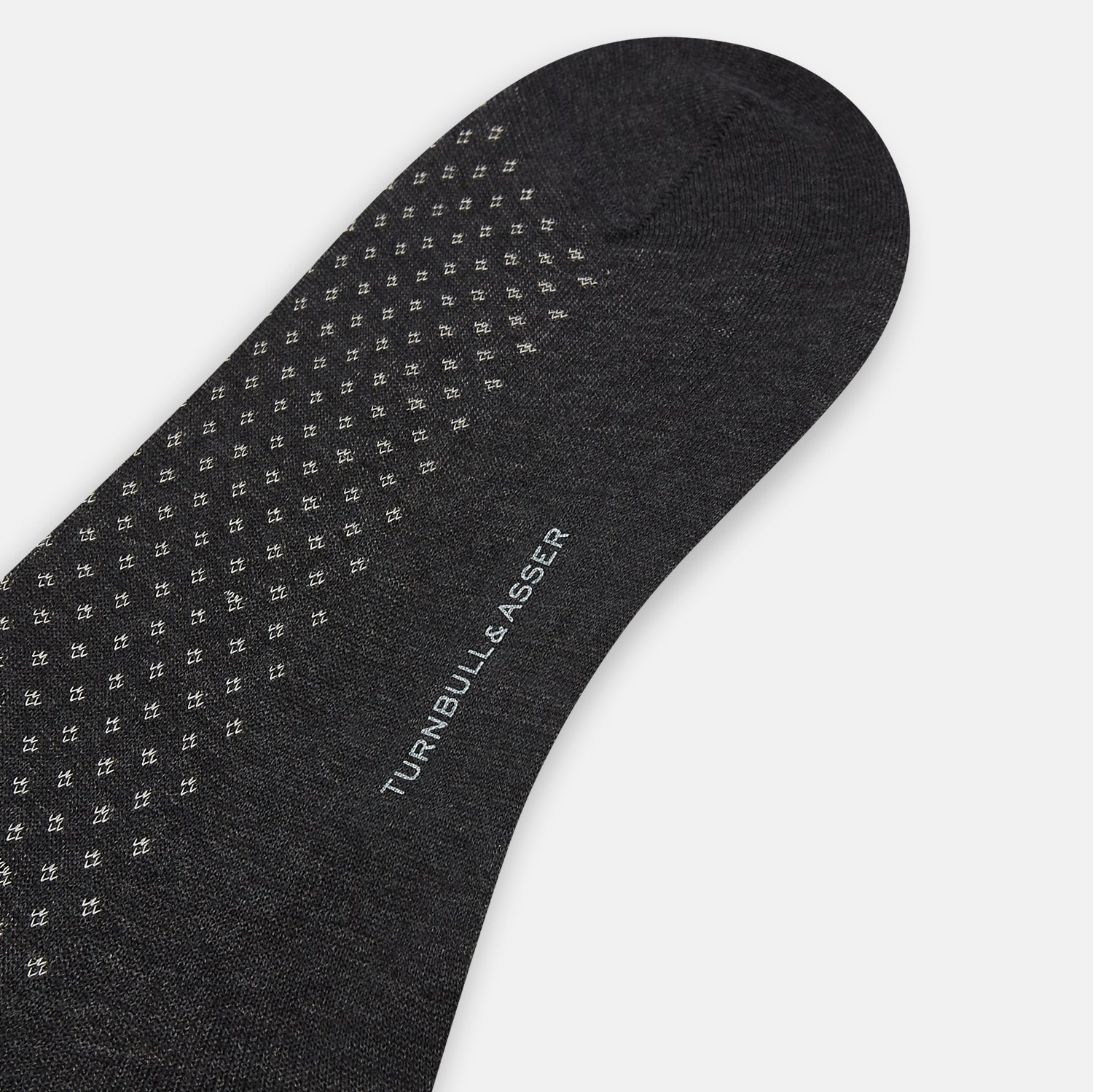 View 3 of product A single Grey Motif Long Sock by Turnbull & Asser, featuring a subtle pattern, is displayed on a plain white background.