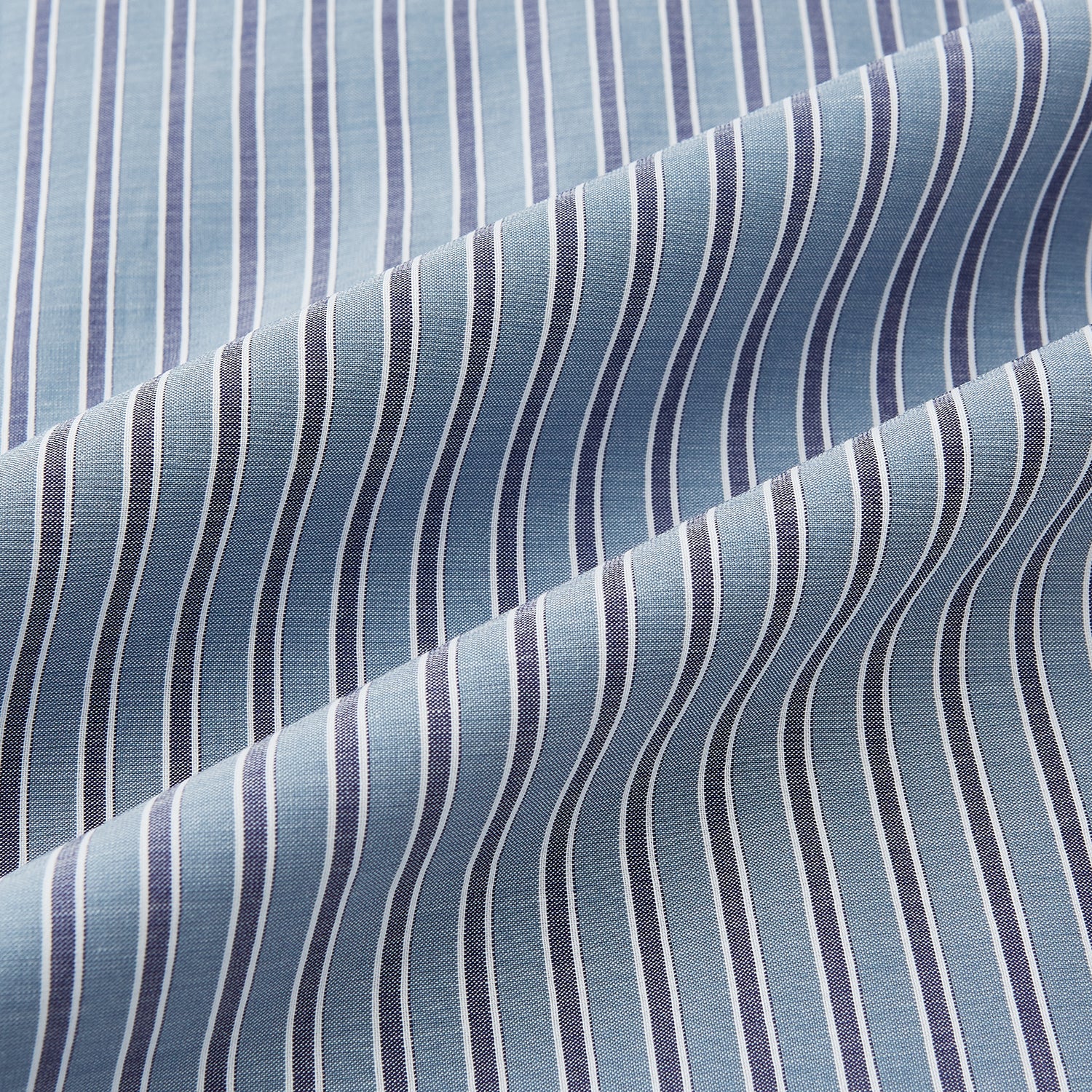 View 6 of product The Steel Grey Ticking Stripe Mayfair Shirt by Turnbull & Asser is a long-sleeved, button-up shirt with a collar, crafted from fine Italian cotton and featuring slim steel grey and white stripes with white buttons for a classic touch.