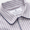 View 4 of product The Turnbull & Asser Red and Blue Multi Stripe Cotton Sussex Nightshirt features long sleeves, a knee-length cut, collared neckline, button placket, chest pocket with dark trim, and rounded hem for luxurious sleepwear.