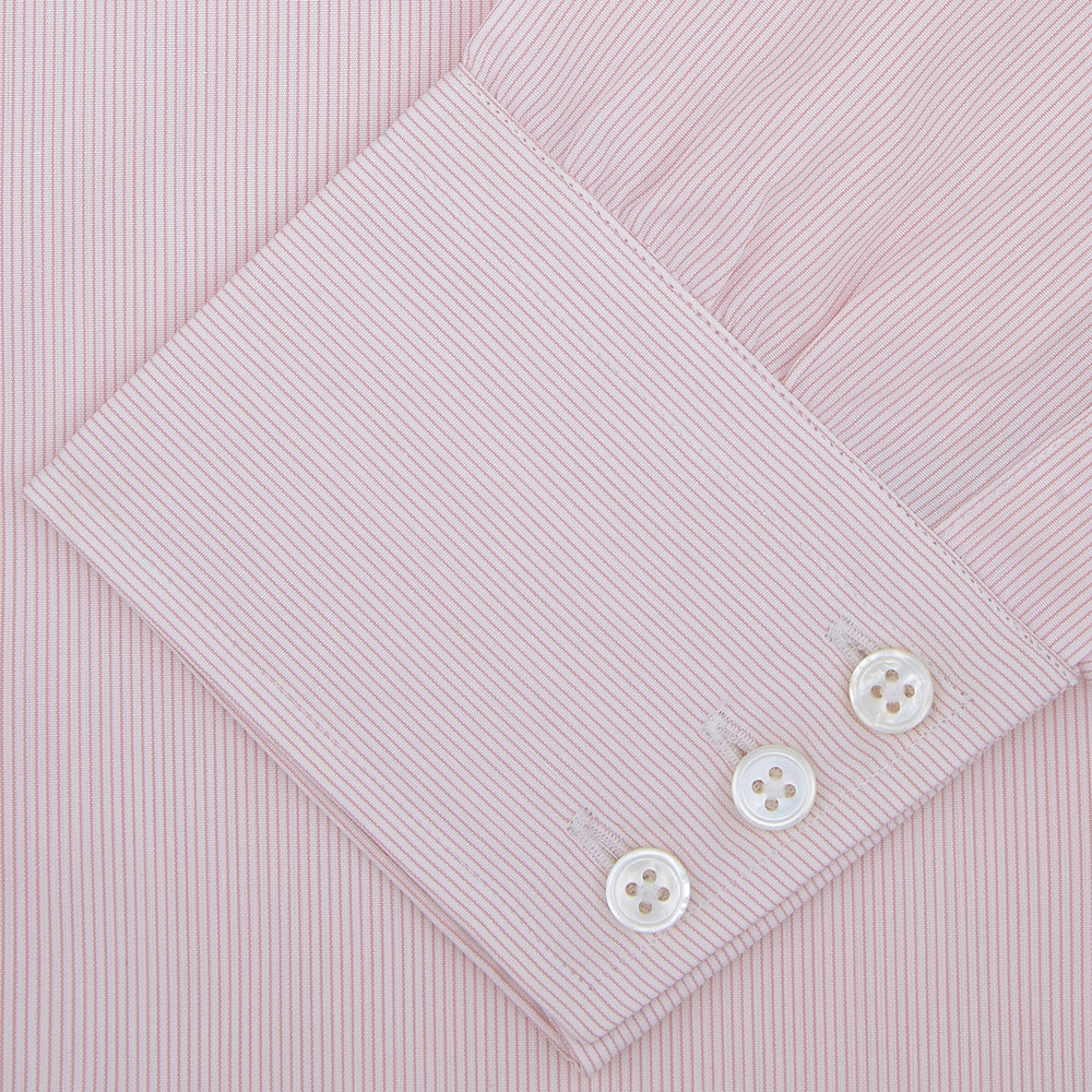 The Turnbull & Asser Pink Hairline Stripe Shirt features a T&A collar and 3-button cuffs, shown neatly folded against a white background—perfect as a smart office shirt.