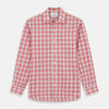 View 1 of product The Turnbull & Asser Red Check Cotton Weekend Fit Finch Shirt is a men's long-sleeved, button-up shirt with a Derby collar and red-and-white plaid pattern, displayed flat on a white background.