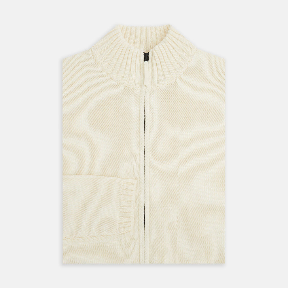 The White Merino High Neck Zipped Cardigan by Turnbull & Asser features a ribbed stand collar, cuffs, and hem. This elegant long-sleeve knitwear piece is shown on a plain white background.