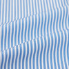 View 6 of product The Sky Blue Halo Stripe Mayfair Shirt by Turnbull & Asser, a long-sleeved button-up with thin blue and white vertical stripes, classic collar and cuffs, is shown laid flat on a white background.
