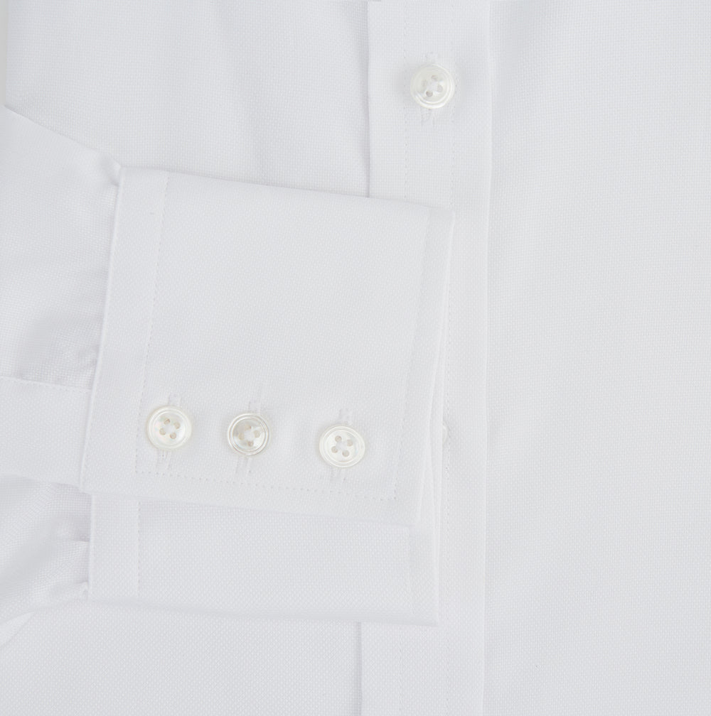 The Turnbull & Asser White Superfine Oxford Cotton Shirt features a T&A collar and 3-button cuffs—ideal for elegant evening attire, shown against a white background.