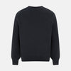 View 3 of product The Turnbull & Asser Dark Green Cashmere V-Neck Jumper features long sleeves, ribbed cuffs, and a ribbed waistband, showcased against a white background.