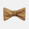 View 1 of product The Thistle Petersham Double End Bow Tie by Turnbull & Asser features a golden brown hue with a subtle diagonal stripe and blue and white square accents—an elegant accessory, pictured on a plain white background.