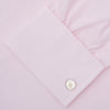 View 3 of product A Turnbull & Asser Pink Cotton Shirt with a T&A collar and double cuffs is displayed against a white background. The men's shirt features long sleeves, white buttons, and the label is visible inside the collar.