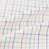 View 6 of product The Rainbow Double Grid Check Mayfair Shirt by Turnbull & Asser features a white base with thin blue, red, and green checks and a T&A collar. It’s displayed neatly laid flat on a white background.