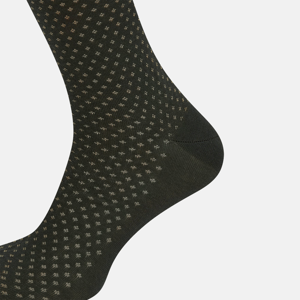 A single forest green mid-length sock from Turnbull & Asser, featuring a motif pattern and crafted from soft mercerised Egyptian cotton, shown against a plain white background.