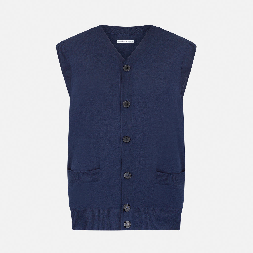 The Turnbull & Asser Navy Fine Merino V-Neck Sleeveless Cardigan features a front button closure, ribbed hem, and two pockets—sophisticated knitwear shown on a plain white background.