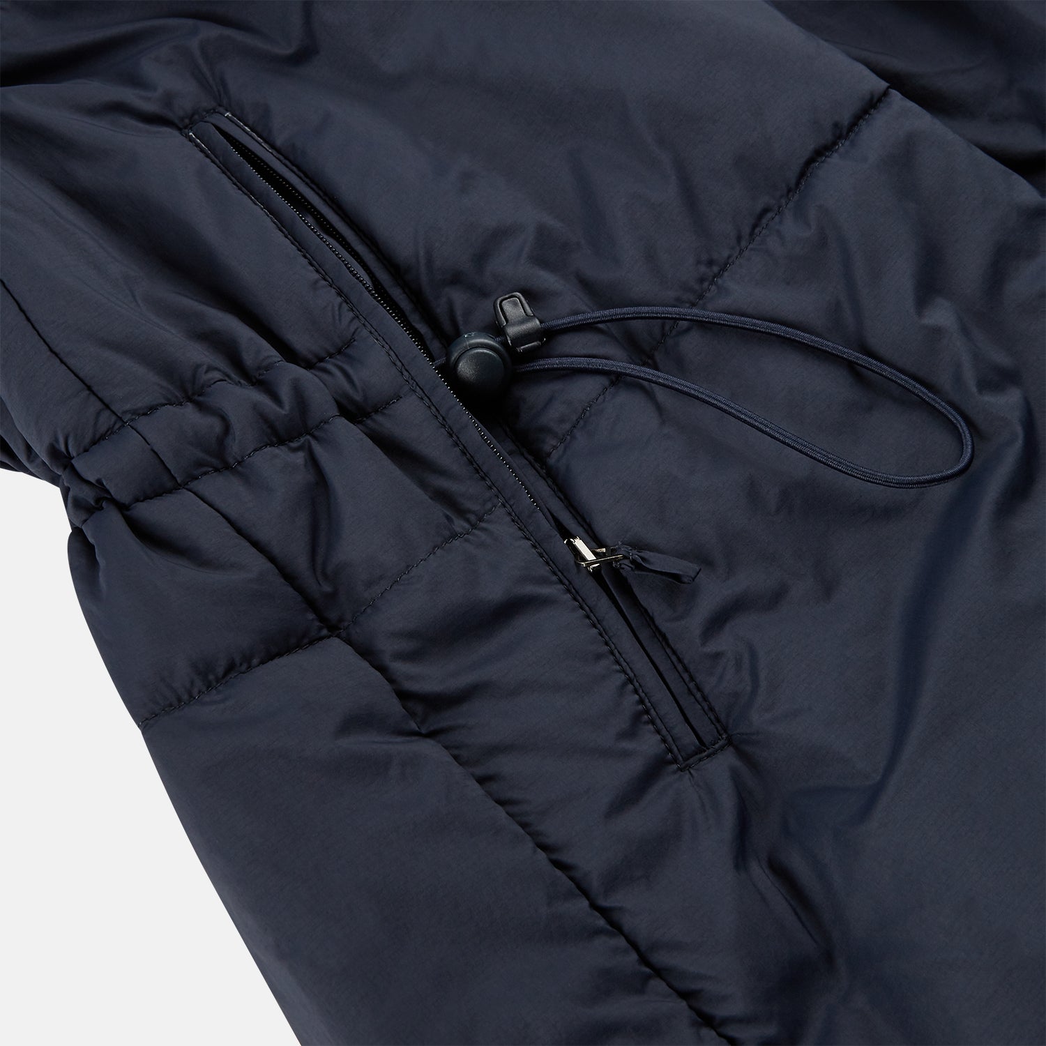 View 8 of product The Turnbull & Asser Charcoal Melange John Arthur Trench Coat, featuring a collar, single-breasted closure, and three zippered pockets—one chest and two at the hips—is shown against a plain white background.