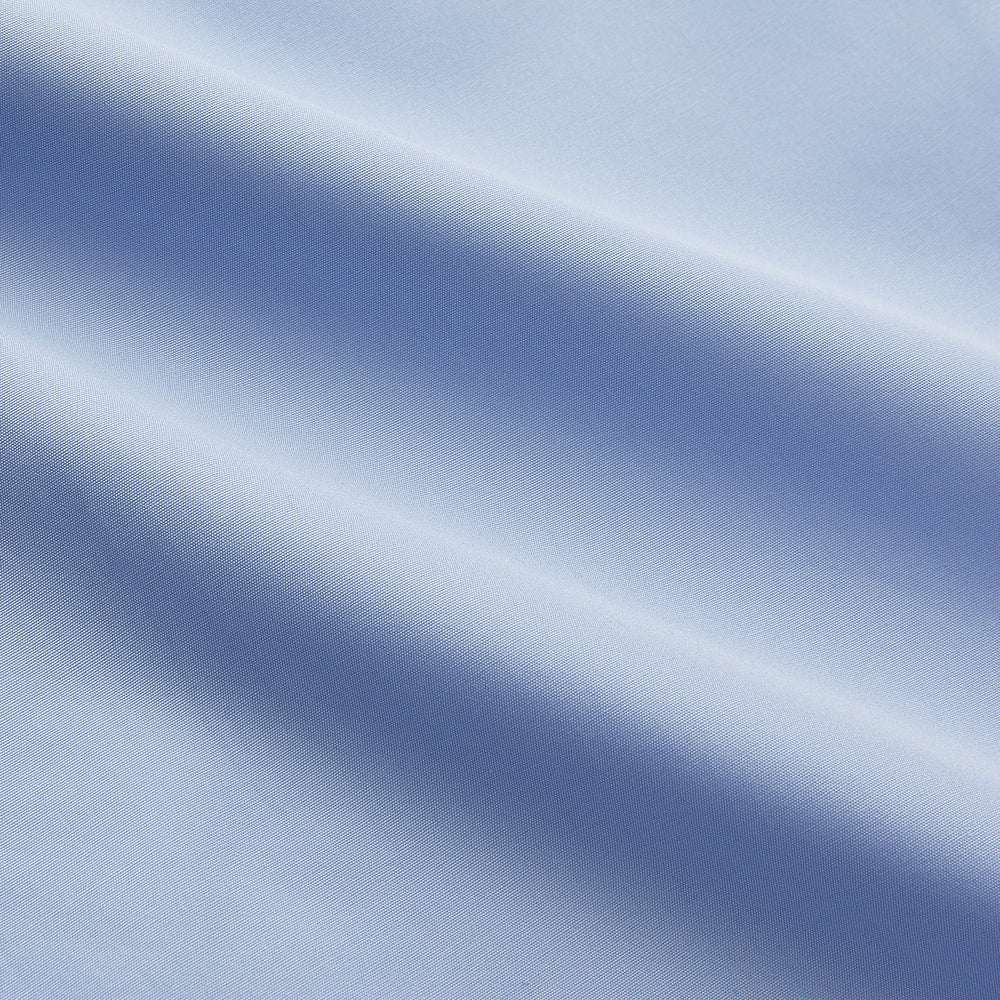 Turnbull & Asser's Tailored Fit Blue Cotton Shirt features a Kent collar, 3-button cuffs, and a clean design—ideal with a navy suit. Displayed on a plain white background.