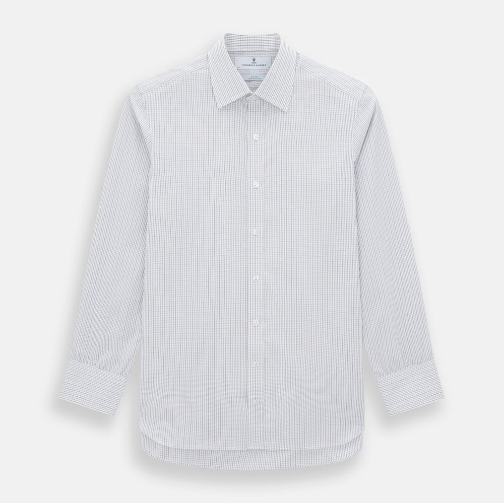 The Turnbull & Asser Pale Blue and Grey Grid Check Mayfair Shirt features long sleeves, a pointed collar, and buttoned cuffs. Crafted from Italian cotton, it displays a subtle grid pattern on a plain white background.