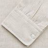 View 3 of product The Turnbull & Asser Light Oatmeal Linen Weekend Fit Unwin Shirt features long sleeves, a band collar, and two chest pockets—an ideal choice for effortless summer style.