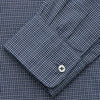 View 3 of product The Turnbull & Asser Navy Check Weekend Fit Flannel Shirt features a stand collar, button front, two chest pockets with flaps, and 1-button cuffs, crafted from soft Italian cotton and shown laid flat on a white background.