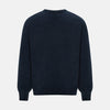 View 3 of product The Turnbull & Asser Midnight Blue Cashmere Round Neck Jumper, featuring long sleeves and ribbed trims, is shown against a light grey background.