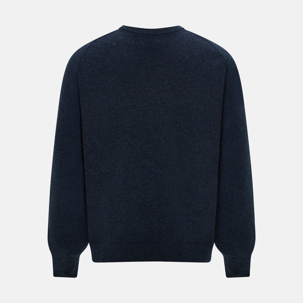 The Turnbull & Asser Midnight Blue Cashmere Round Neck Jumper, featuring long sleeves and ribbed trims, is shown against a light grey background.