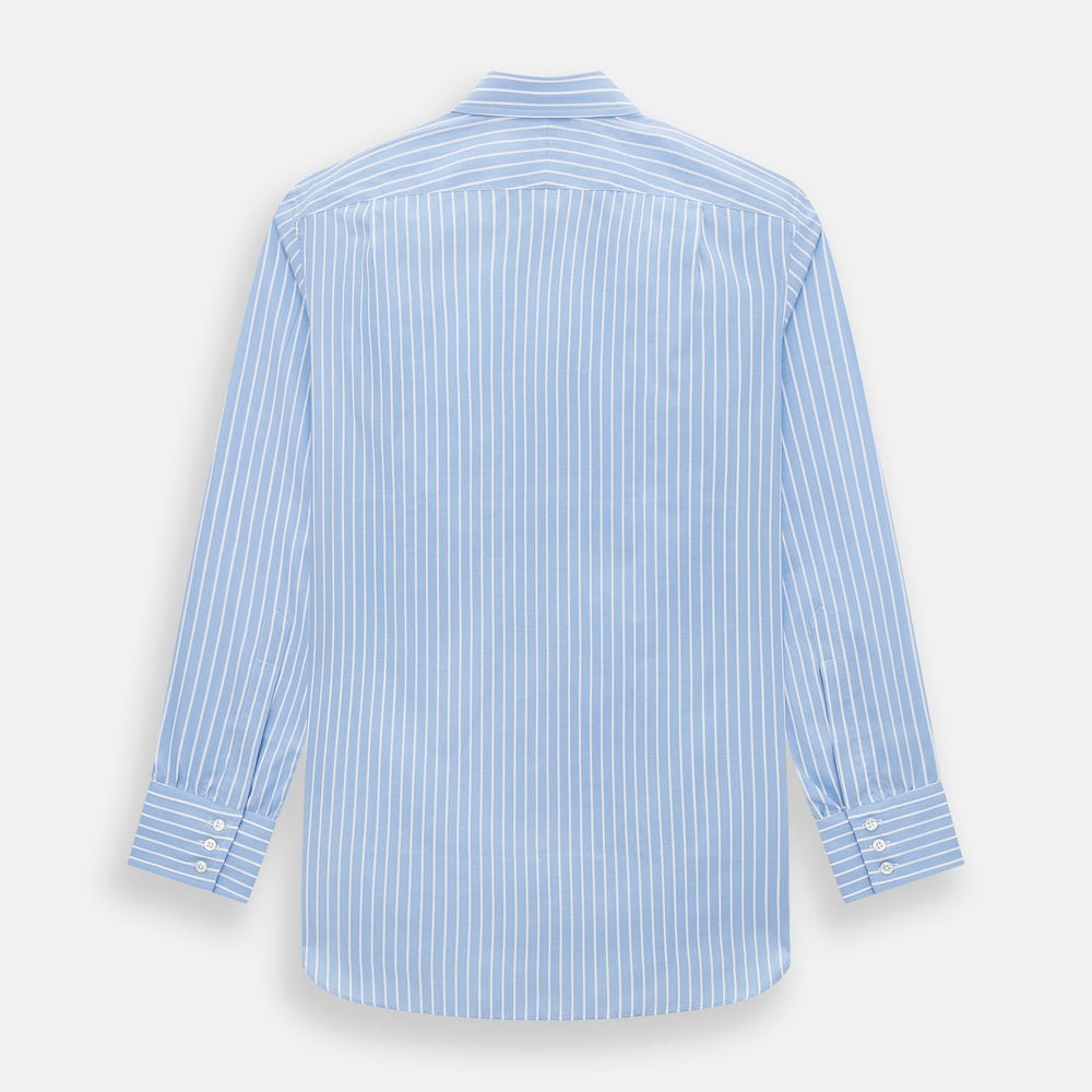 The Turnbull & Asser Sky Blue Wide Pinstripe Mayfair Shirt features long sleeves, a classic collar, and buttoned cuffs, laid flat against a white background for a refined formal look.
