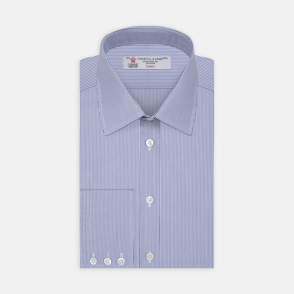 The Turnbull & Asser Blue Fine Bengal Stripe Shirt features a classic T&A collar, 3-button cuffs, and white buttons, crafted from fine cotton and displayed against a crisp white background.