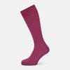 View 1 of product A single Turnbull & Asser Pink Mid-Length Sock is shown upright on a plain white background. The luxury sock has a ribbed texture and a subtly darker ribbed cuff at the top, creating an elegant finish.