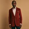 View 2 of product The Rust Cord Barrington Blazer by Turnbull & Asser is tailored in Italy with notch lapels, two front buttons, three pockets, and four-button cuffs, shown flat on a white background.