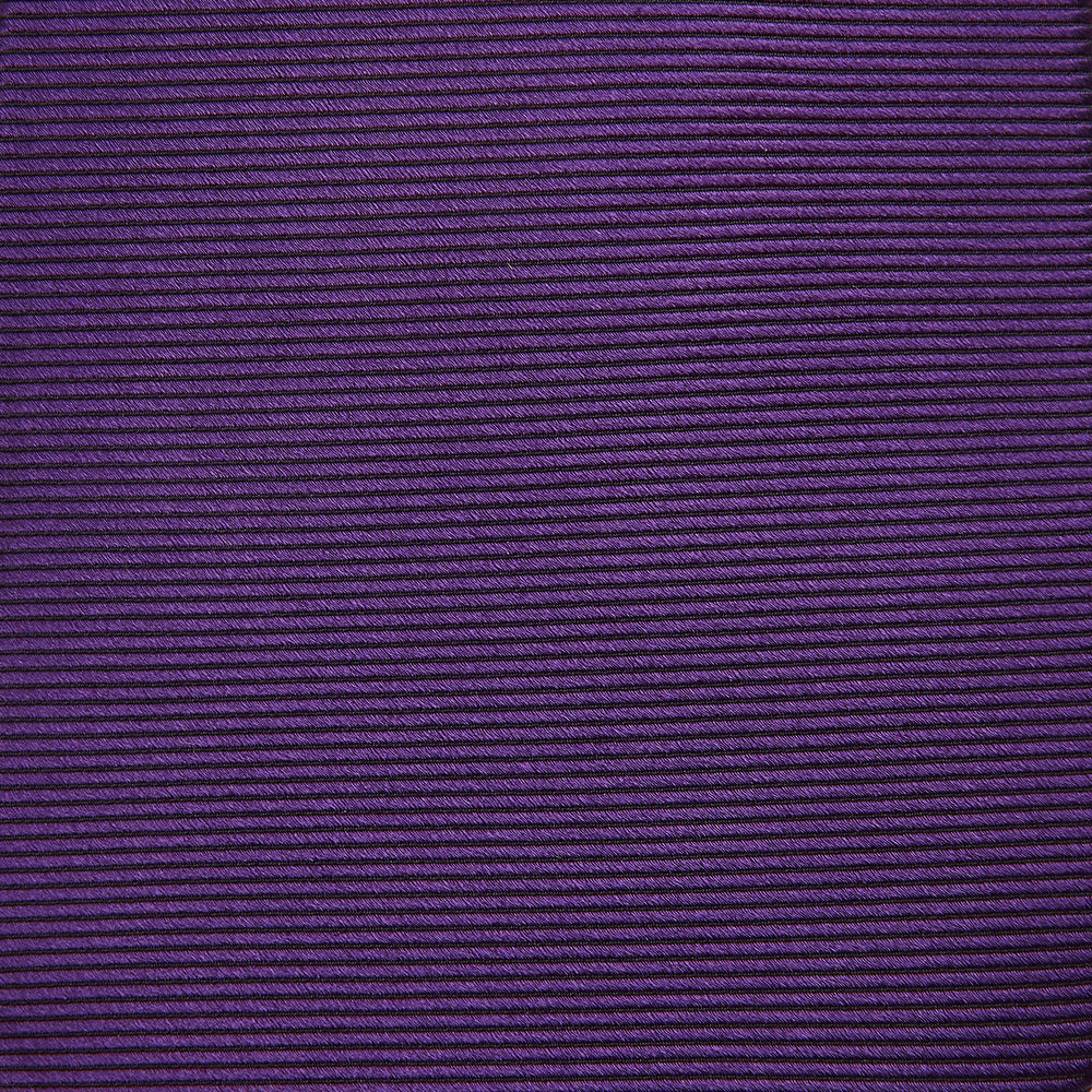 The HORIZONTAL TWILL PLUM TIE by Turnbull & Asser features a solid purple hue and smooth, subtly textured fabric—a versatile accessory to elevate any wardrobe, shown elegantly against a white background.