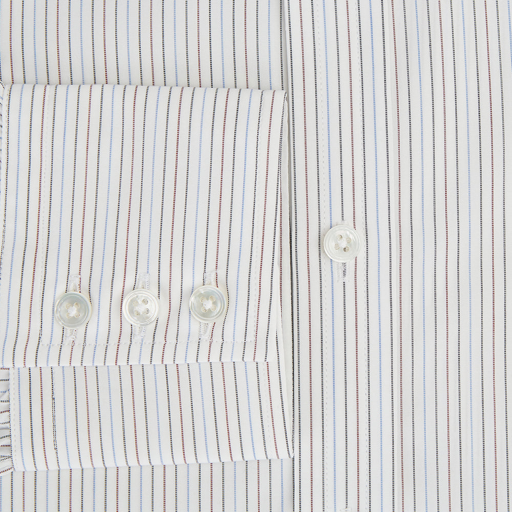 The Turnbull & Asser Red and Blue Double Pinstripe Mayfair Shirt features long sleeves, a collar, and button-up front, crafted from fine Italian cotton, displayed on a plain white background.
