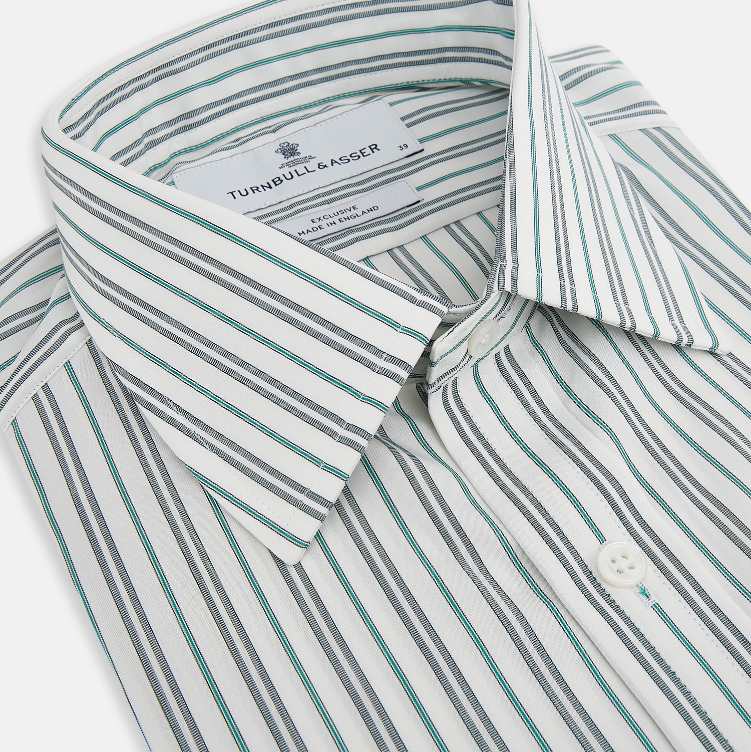View 2 of product The Forest Green Multi Stripe Mayfair Shirt by Turnbull & Asser features forest green and white vertical stripes, a collar and cuffs, and is crafted from Italian cotton, shown laid flat on a white background.