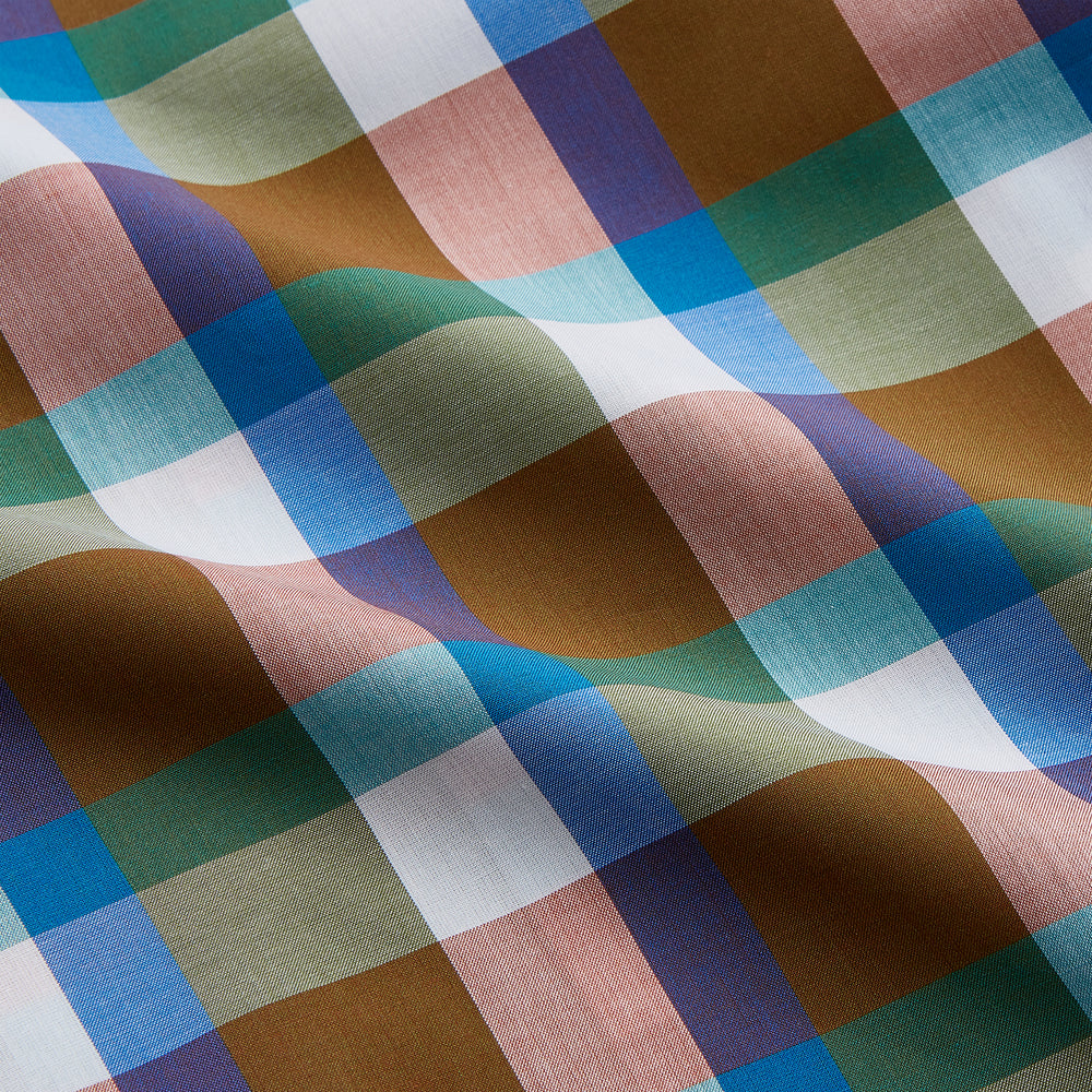 The Turnbull & Asser Green and Pink Multi-check Cotton Blend Regular Fit Mayfair Shirt features a classic T&A collar, white buttons, and an olive green, blue, white, and pink plaid pattern.