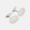 View 1 of product Turnbull & Asser Silver Striped Oval Cufflinks feature a classic diagonal pattern on a silver oval face, displayed against a plain white background.