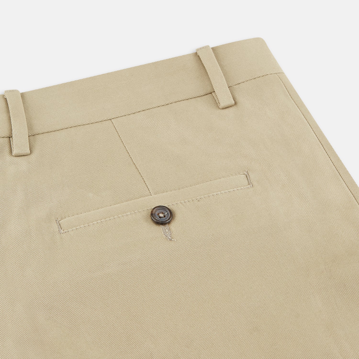 View 2 of product The Turnbull & Asser Beige Cotton Blend Manson Trousers feature a straight-leg cut, belt loops, side pockets, and a button closure, shown on a plain white background.